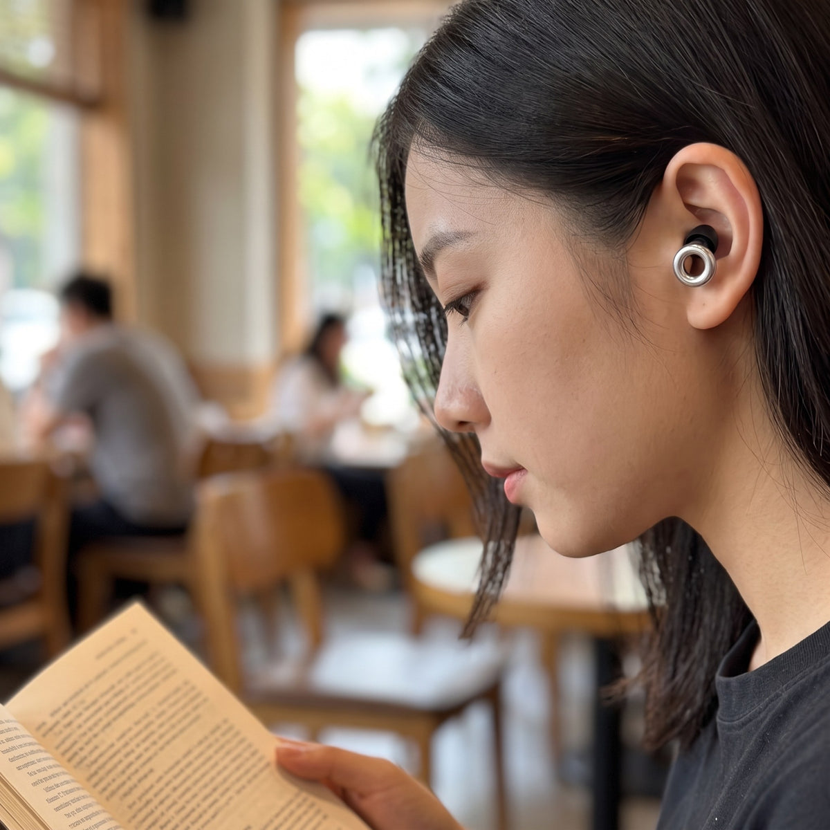 FocusPlugs noise-reducing earplugs in use at home
