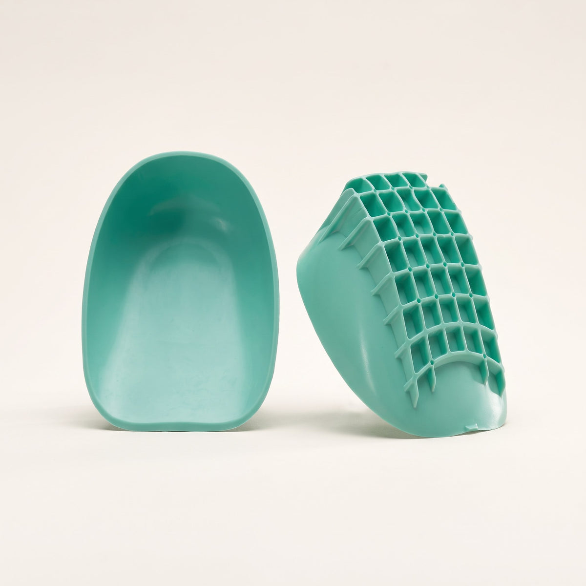Silicone heel cups on a plain background