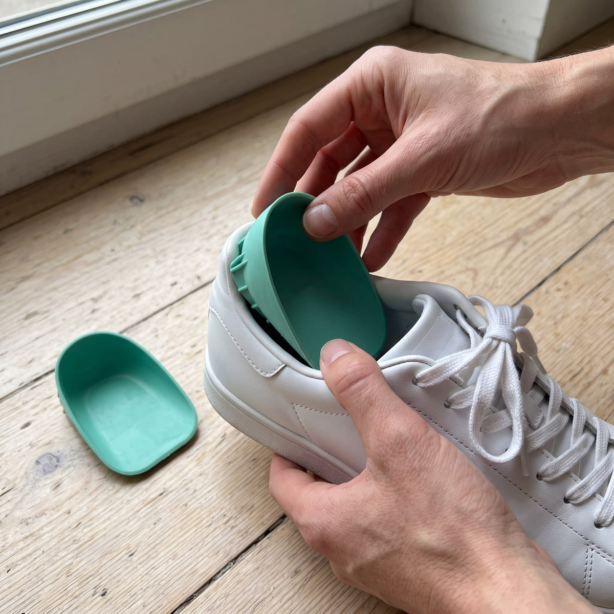 Silicone heel cups in use at home