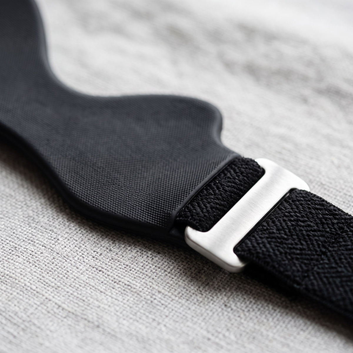 Close-up of the Strydex Precision Strap's silicone pad, woven band and buckle