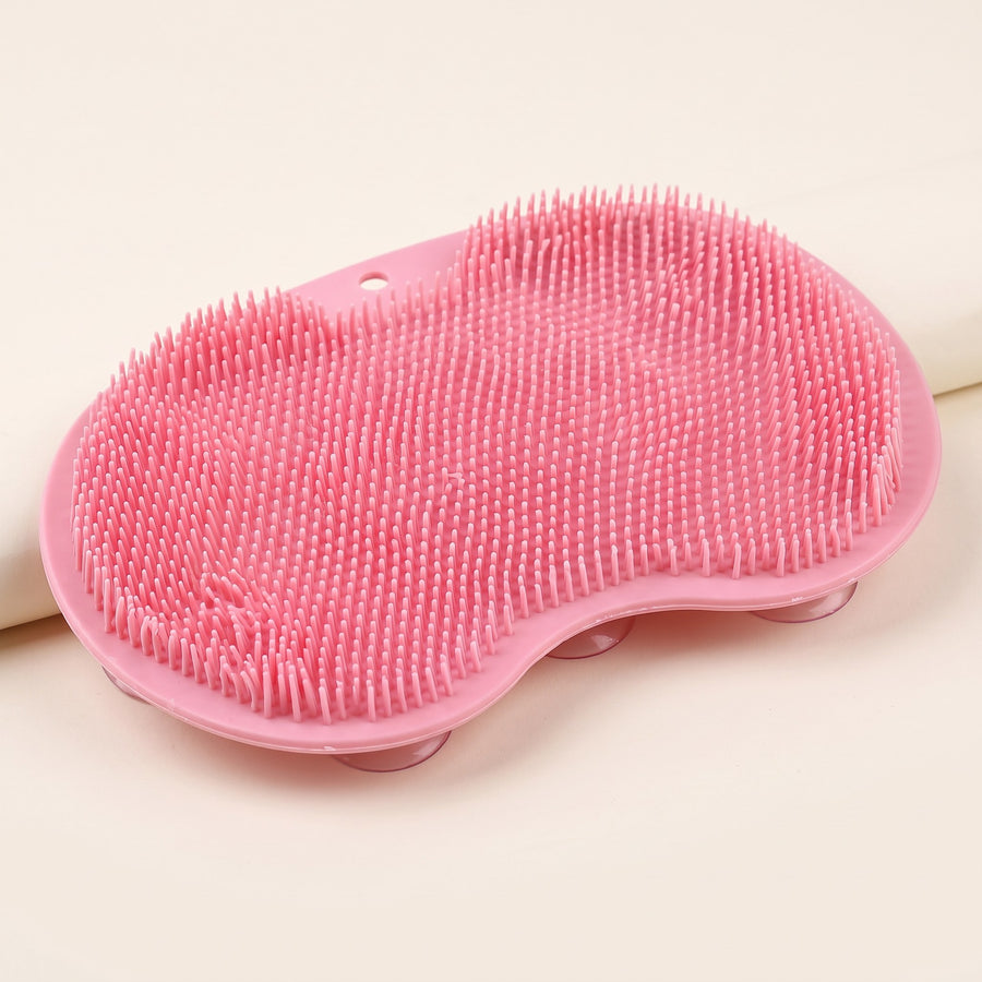 Shower foot scrubber mat on a plain background