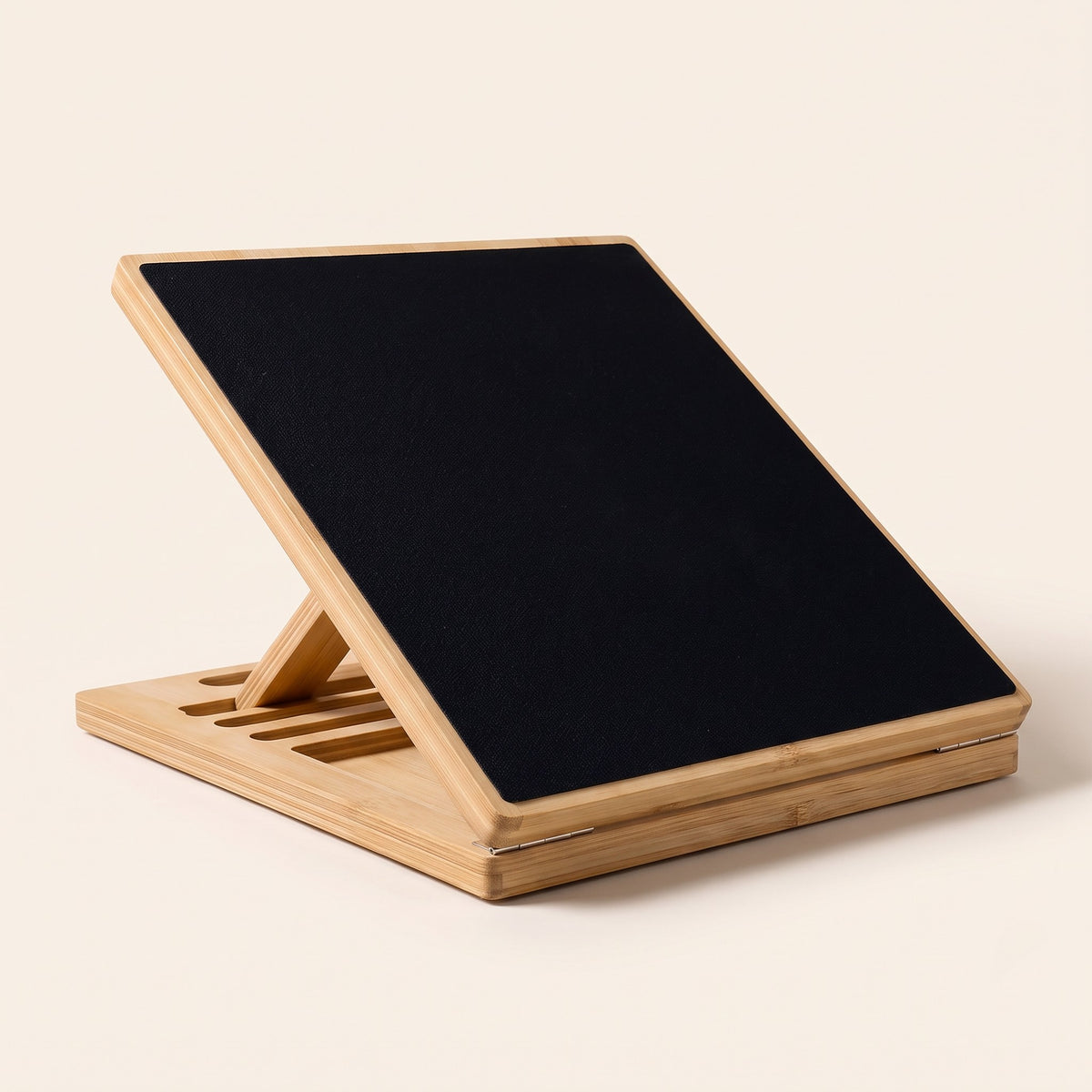 Adjustable slant board on a plain background